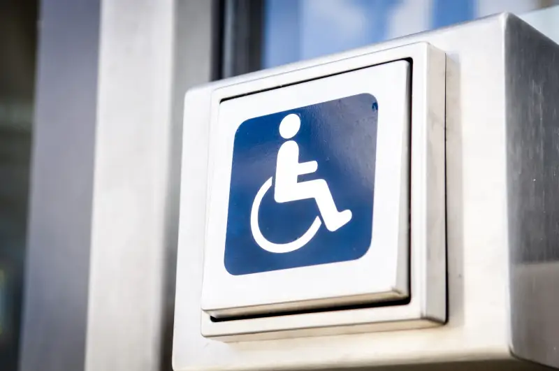 door opener button for disabled people at an office building<br />